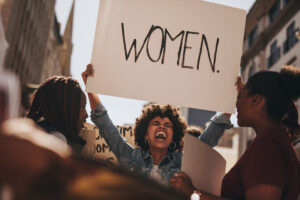 Group of female demonstrating outdoors