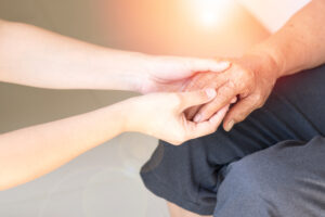 Geriatric doctor or geriatrician concept Doctor physician hand